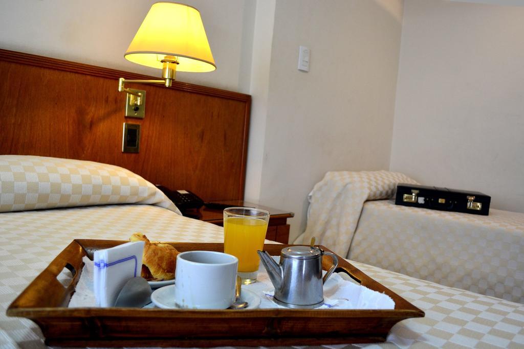 Hotel Rosario Habitación foto